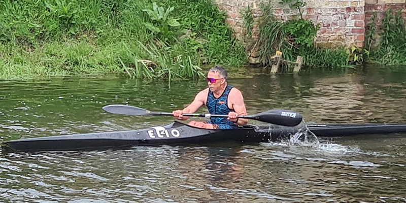 Keith Longney kayaking in European quadrathlon event
