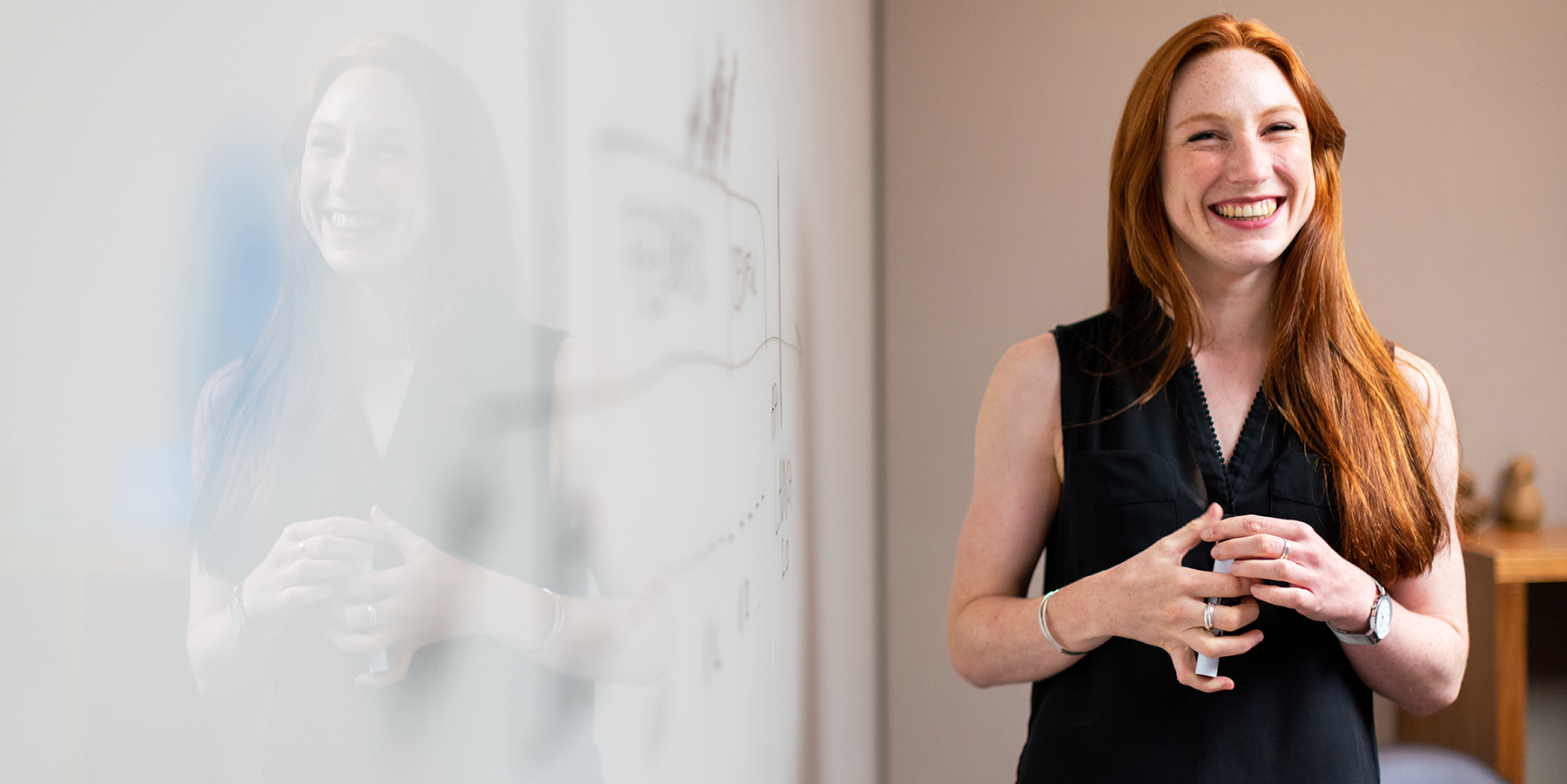 Happy, smiling and confident female business leader