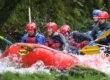Group white water rafting in North Wales