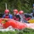 Group white water rafting in North Wales